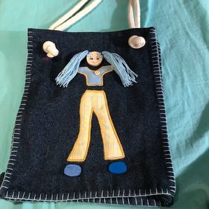 One of a kind Denim tote. Hip ponty tail girl